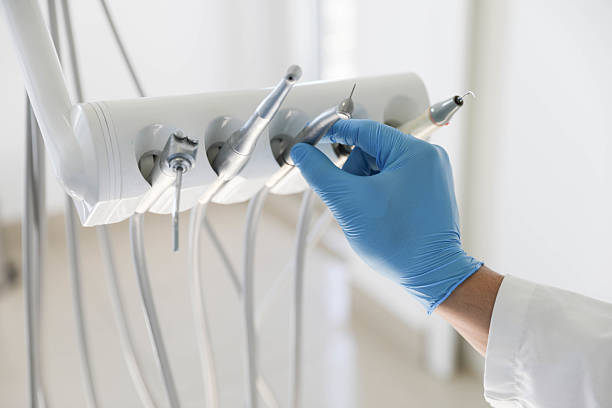 Professional Tooth Extraction technician working in Fredericksburg, TX
